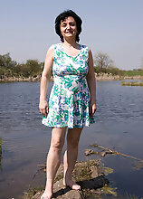 Sandra Tugs At Her Full Bush While Enjoying The Scenes At The Waterfront