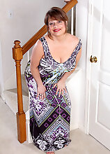 48 Year Old Penny Beavers Stuffs Her Large Tits Into The Stair Railings