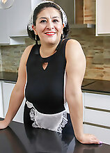 This Spanish Mature Housewmaid Plays With The Carrots From Her Work