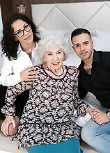 Horny Granny Gets It In A Threesome With A Tatooed Younger Couple