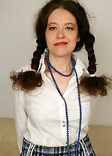 Horny Housewife With Pigtails Goes Crazy On Her Couch