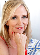 55 Year Old Annabelle Stabs At Her Mature Pussy With A Big Dildo