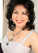 Mature Mama Nataly Slips Out Of Her Dress